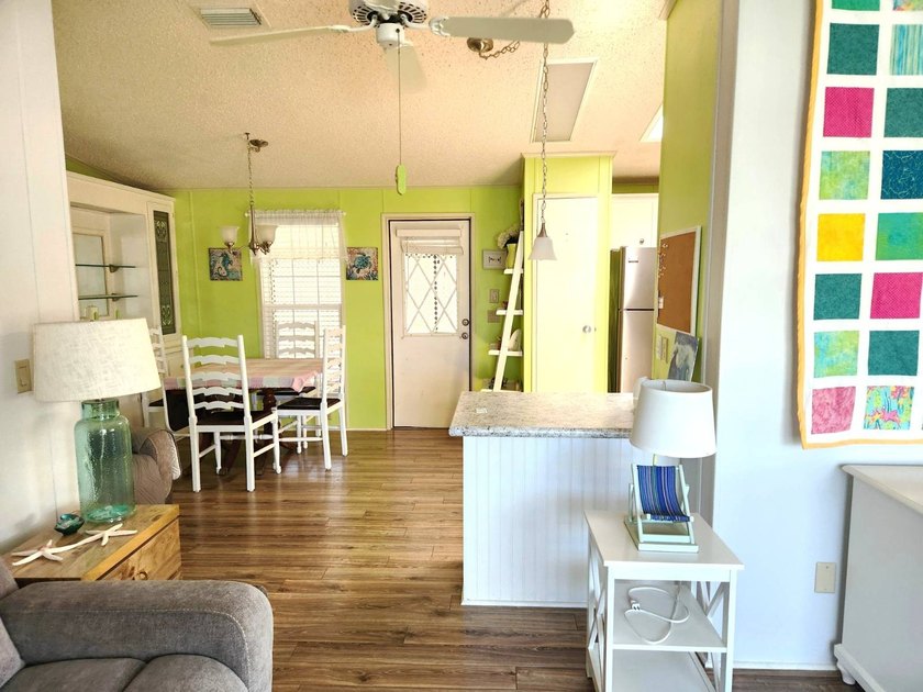 This home has it all . . . location, floorplan and personality - photo 5
