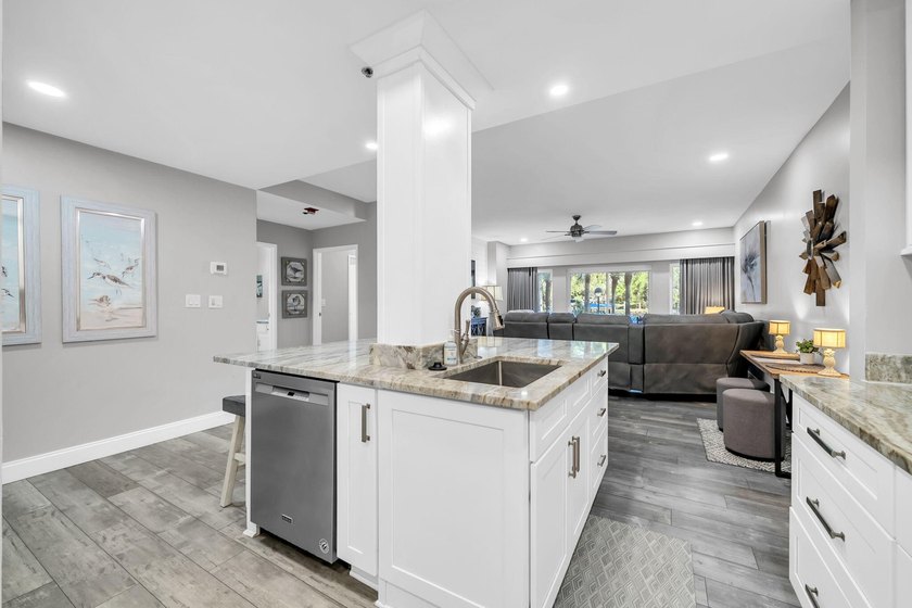 This gorgeous condo has been completely remodeled. Stunning open - photo 11