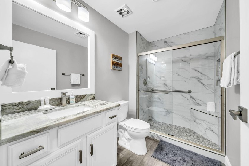 This gorgeous condo has been completely remodeled. Stunning open - photo 22