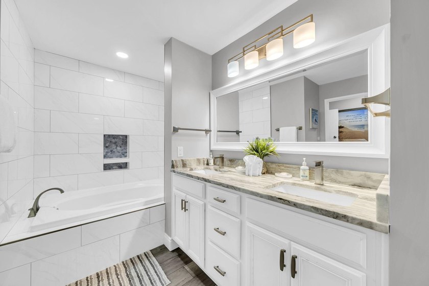 This gorgeous condo has been completely remodeled. Stunning open - photo 30
