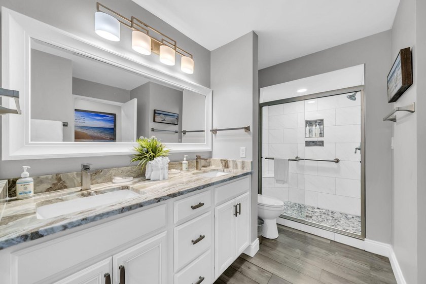 This gorgeous condo has been completely remodeled. Stunning open - photo 31