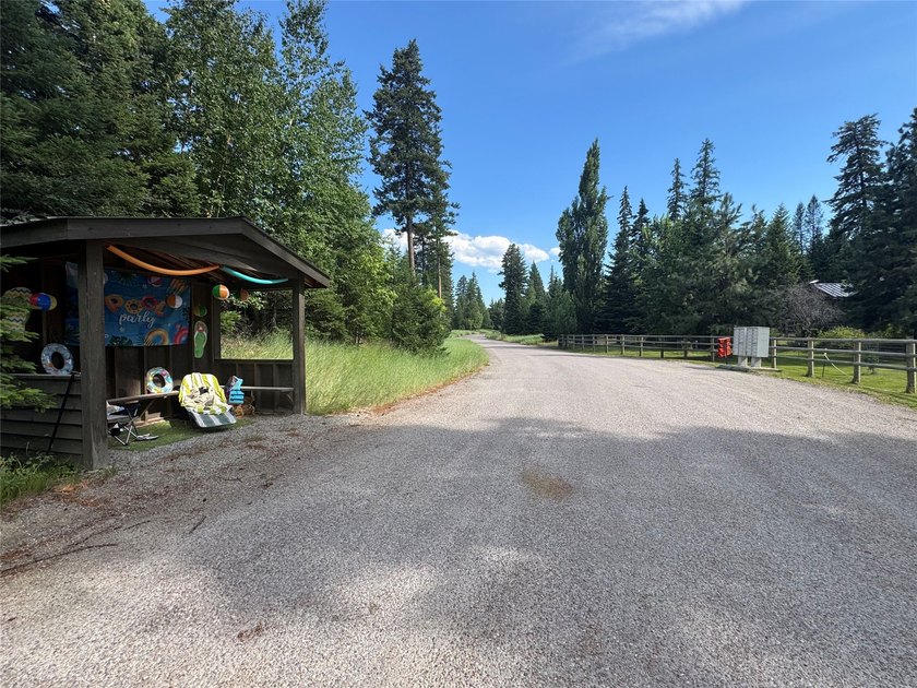 Tucked into a peaceful pocket near Swan Lake, this .67-acre lot - photo 14