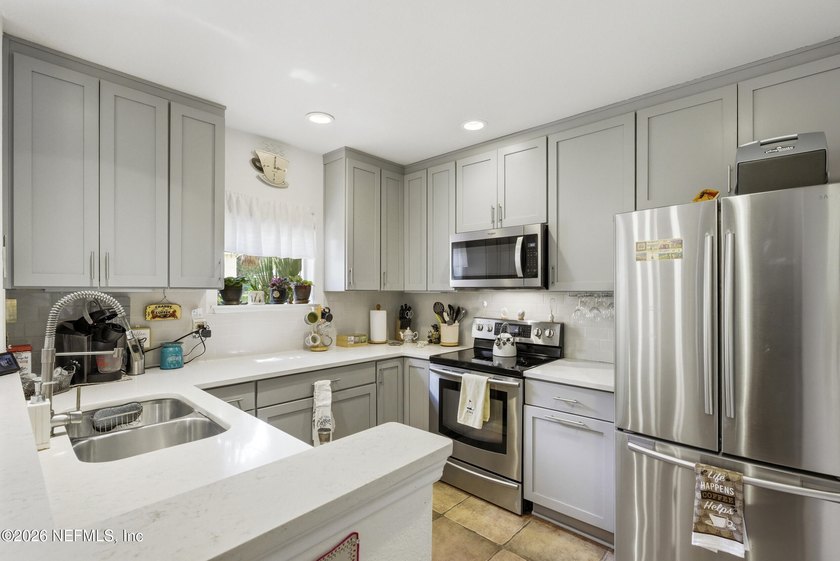 Beautifully curated 3BR/2BA ground-floor condo in the - photo 8