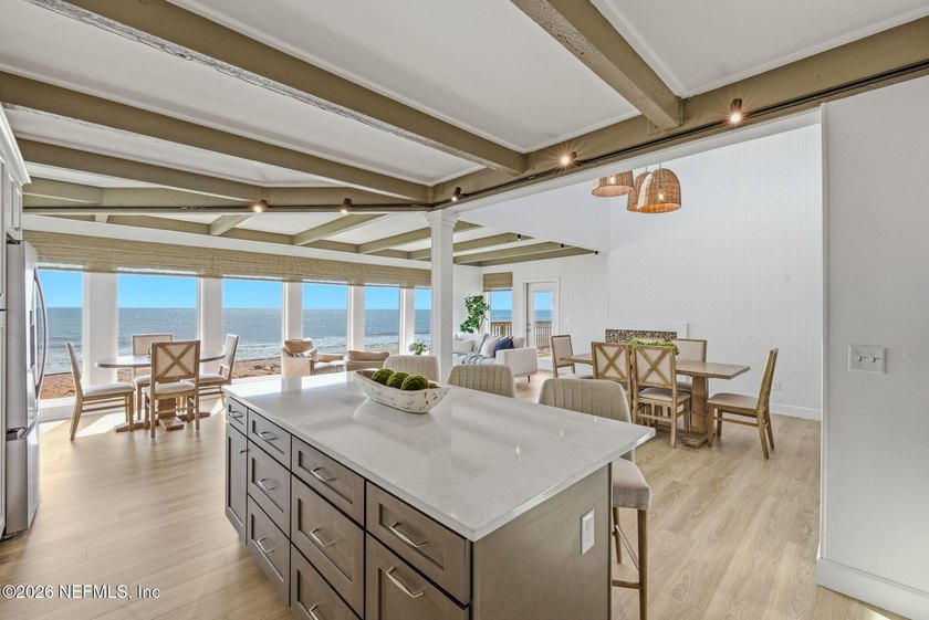 Discover luxury living in this completely renovated oceanfront - photo 8