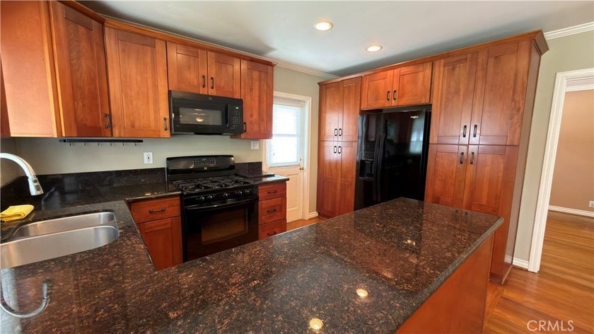 5535 E. Mezzanine Way-South of Conant Area; Very Desirable Long - photo 7