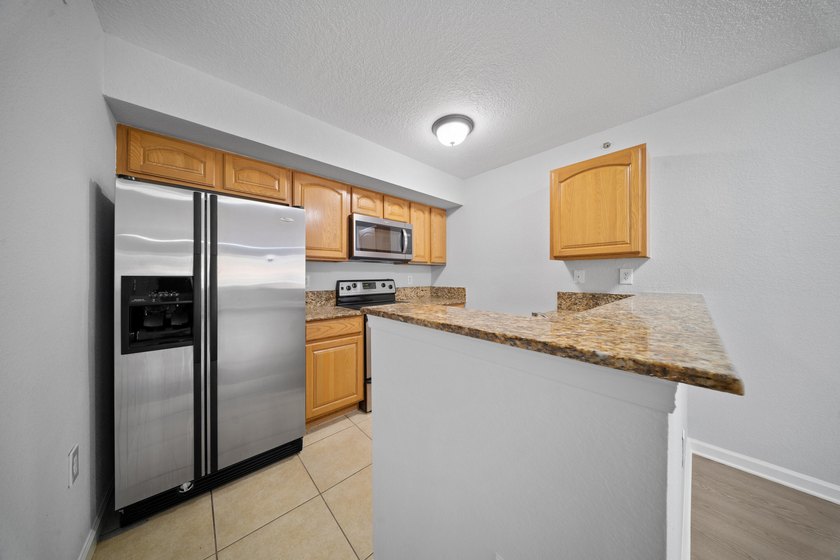 A spacious first floor 3 bedroom 2 bath condo located in a - photo 13