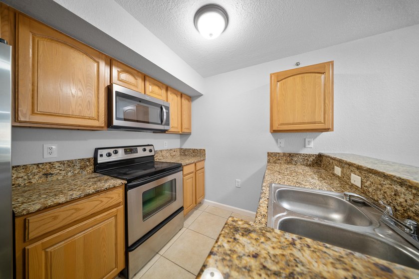 A spacious first floor 3 bedroom 2 bath condo located in a - photo 15