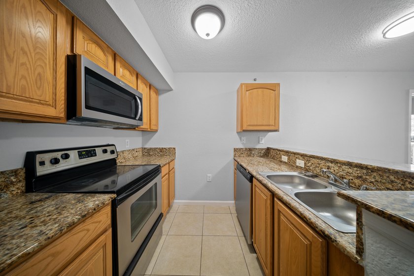 A spacious first floor 3 bedroom 2 bath condo located in a - photo 16