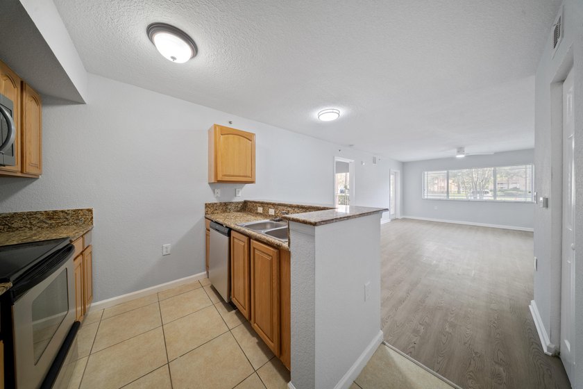 A spacious first floor 3 bedroom 2 bath condo located in a - photo 17