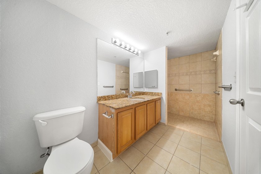 A spacious first floor 3 bedroom 2 bath condo located in a - photo 21