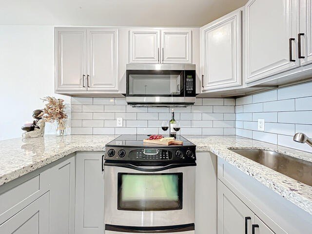 Tenant occupied serene lakefront unit in a 55+ gated community - photo 5