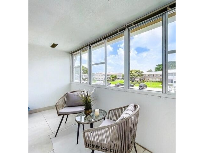 Tenant occupied serene lakefront unit in a 55+ gated community - photo 10