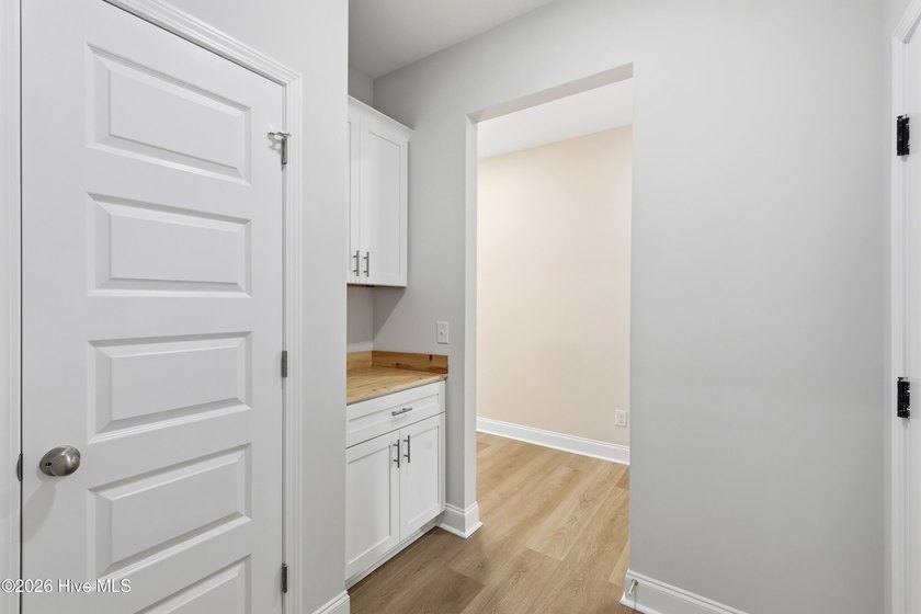 Over a half acre privacy, award-winning craftsmanship, and an - photo 11