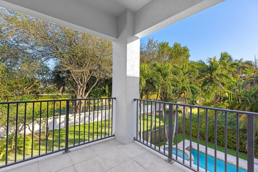 This classic Mediterranean estate in The Oaks has been - photo 18
