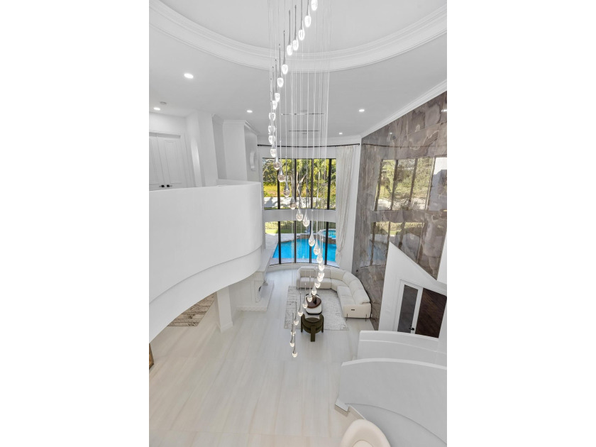 This classic Mediterranean estate in The Oaks has been - photo 32