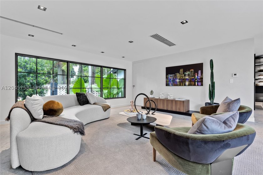 Featured on Netflix's Designing Miami, this fully renovated - photo 3