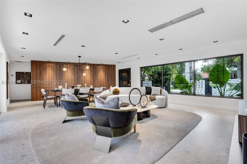 Featured on Netflix's Designing Miami, this fully renovated - photo 4