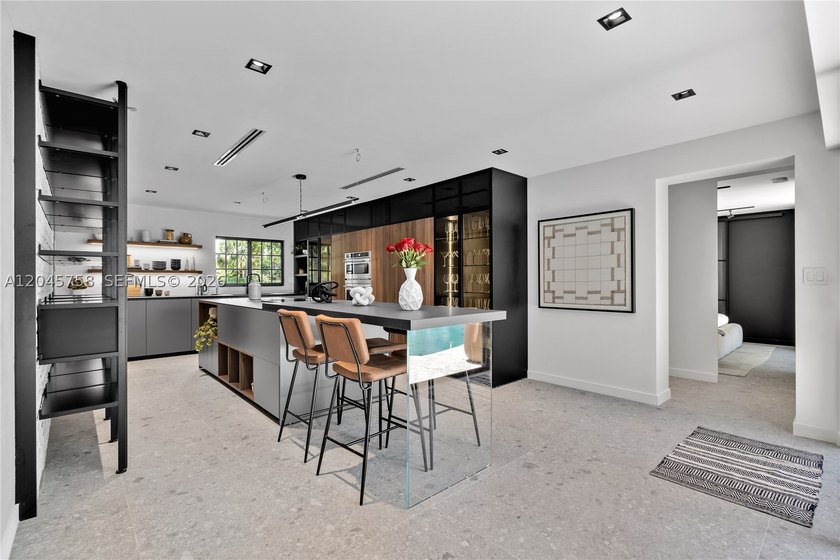 Featured on Netflix's Designing Miami, this fully renovated - photo 10