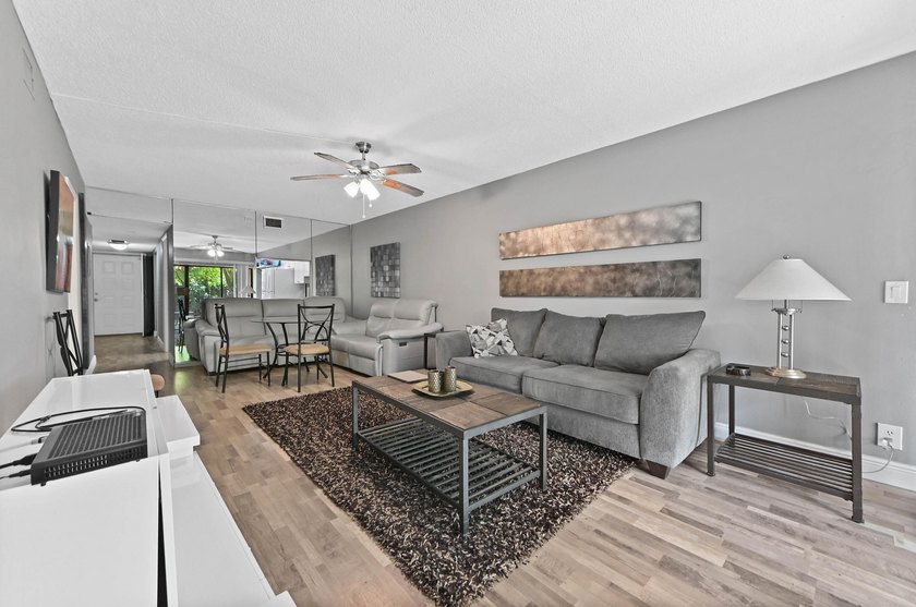 Discover this charming 2-bedroom, 2-bathroom ground floor - photo 2