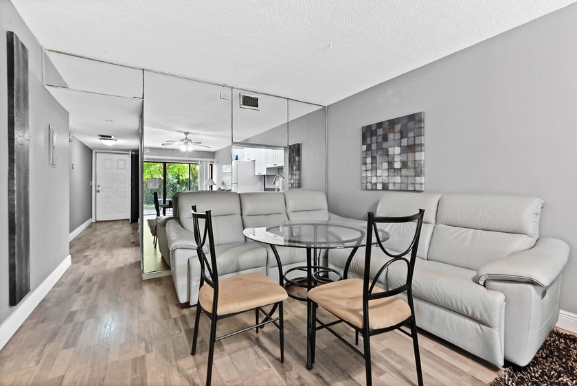Discover this charming 2-bedroom, 2-bathroom ground floor - photo 9