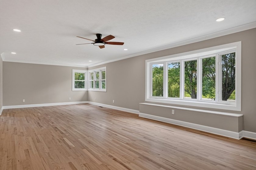 Completely remodeled and move-in ready! This beautiful brick - photo 3