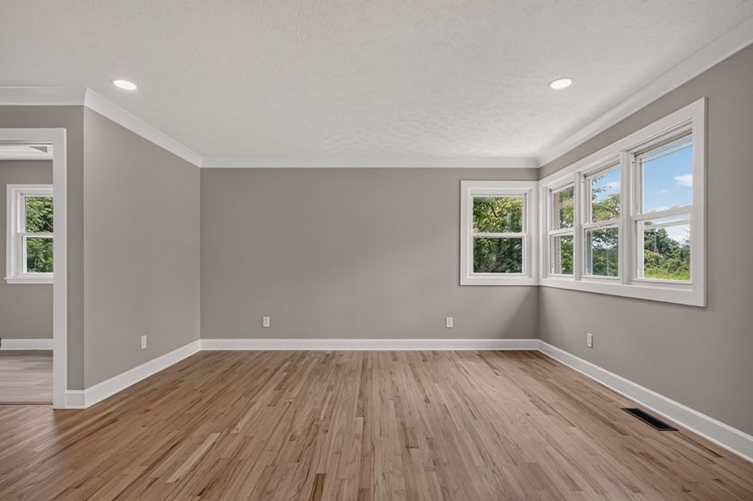 Completely remodeled and move-in ready! This beautiful brick - photo 4
