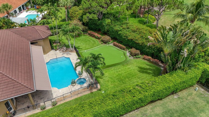 Exceptional estate pool home privately nestled along the 5th - photo 5