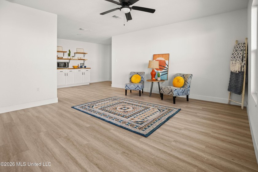 Welcome to a beautifully renovated 4-bedroom, 2-bath residence - photo 3