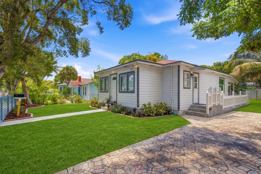This charming single-family home, nestled in the heart of West - photo 3