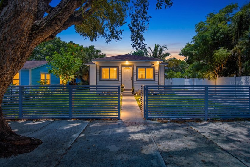 This charming single-family home, nestled in the heart of West - photo 4