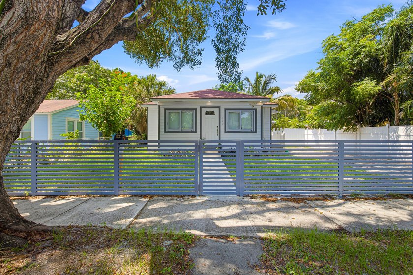 This charming single-family home, nestled in the heart of West - photo 5