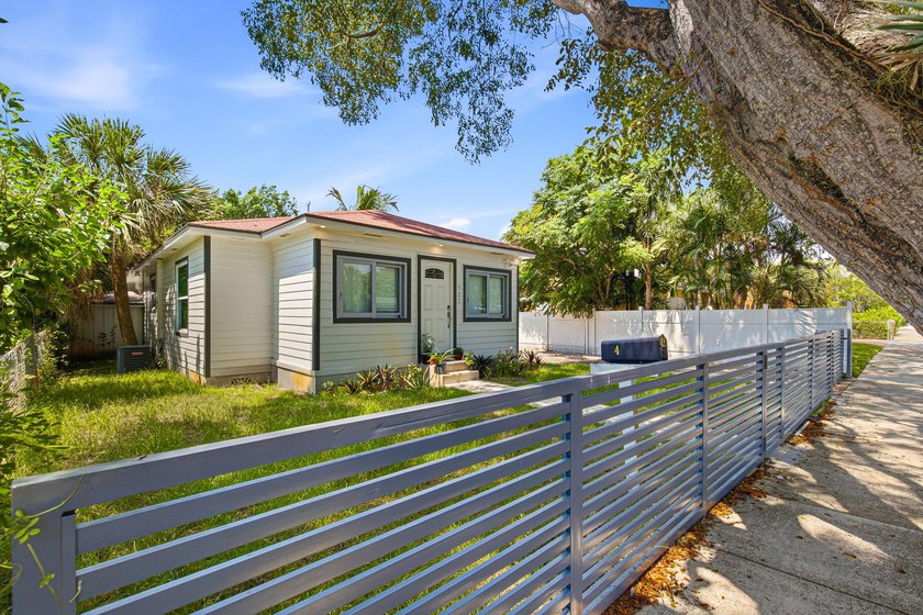 This charming single-family home, nestled in the heart of West - photo 6