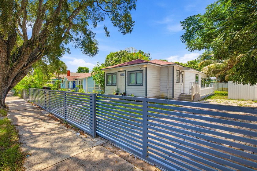 This charming single-family home, nestled in the heart of West - photo 7