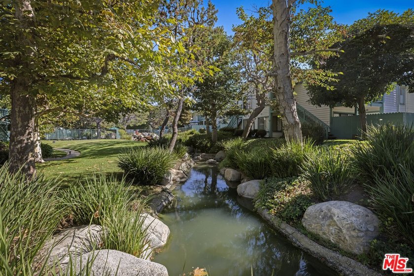 Ideally situated in Ponderosa West, this bright 1-bedroom - photo 23