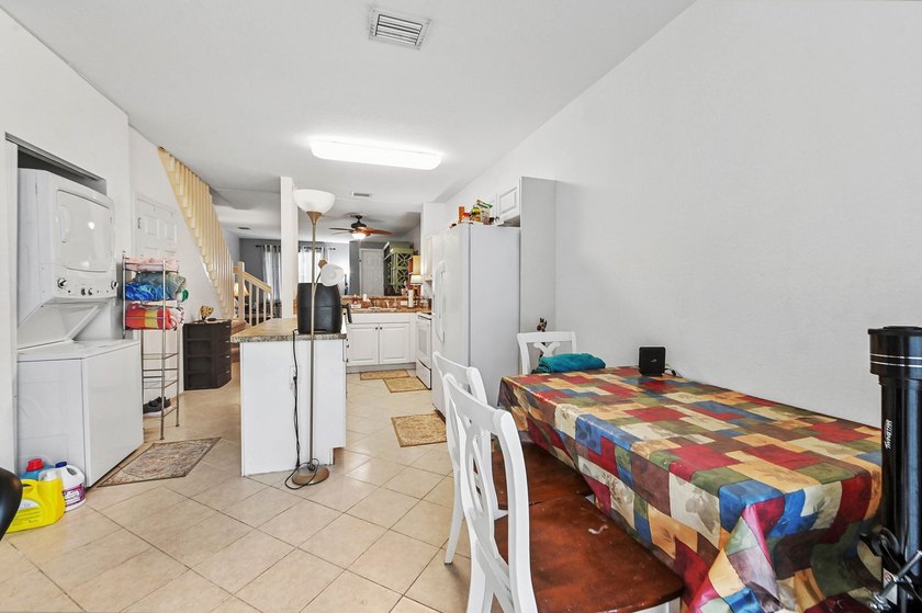 Welcome to this charming 3-bedroom, 2.5-bathroom townhouse - photo 8