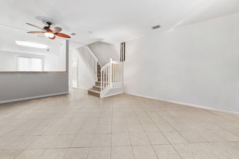 Welcome to this charming 3-bedroom, 2.5-bathroom townhouse - photo 10