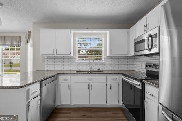 A beautifully updated 3 bedroom, 2 bath home located in the - photo 12