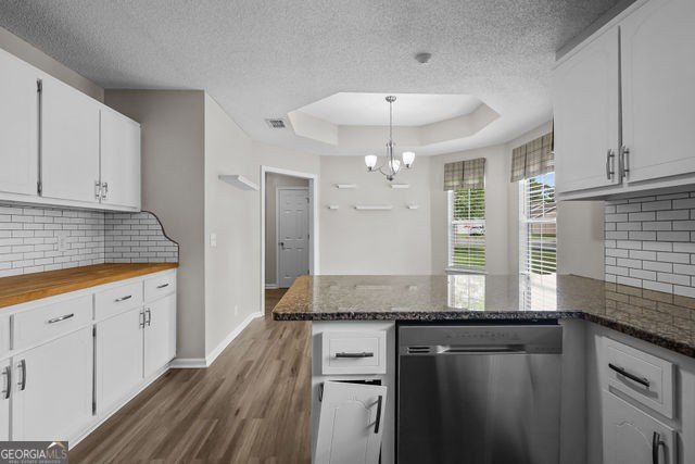 A beautifully updated 3 bedroom, 2 bath home located in the - photo 13