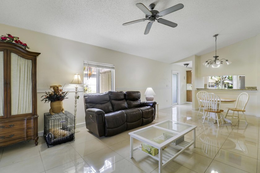Welcome to this charming 3-bedroom, 2-bathroom villa situated in - photo 7