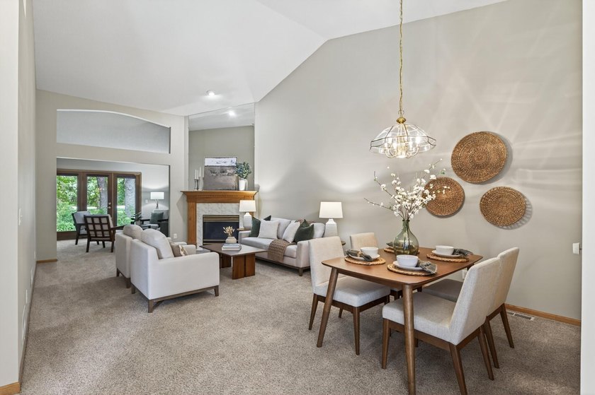 This beautiful 2 bedroom, 2 bath end-unit townhome offers tons - photo 2