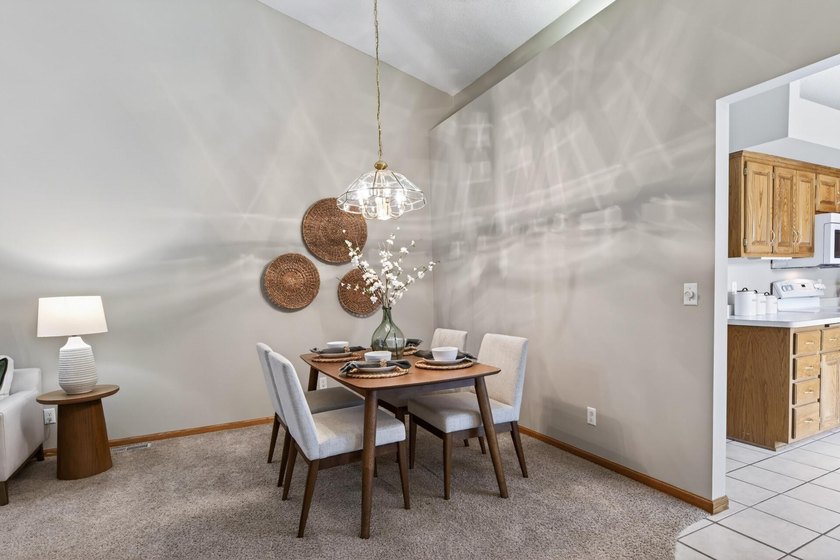 This beautiful 2 bedroom, 2 bath end-unit townhome offers tons - photo 3