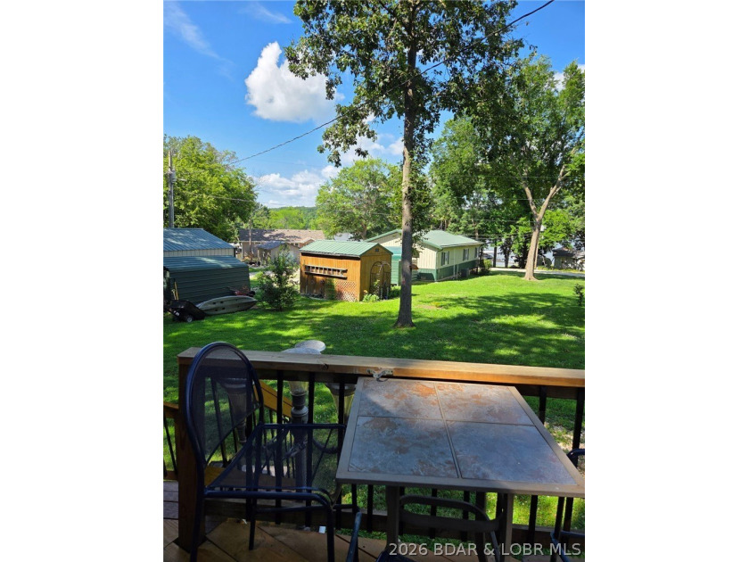 TWO HOMES &amp; A LAKEFRONT LOT - Unique Investment Opportunity at - photo 12