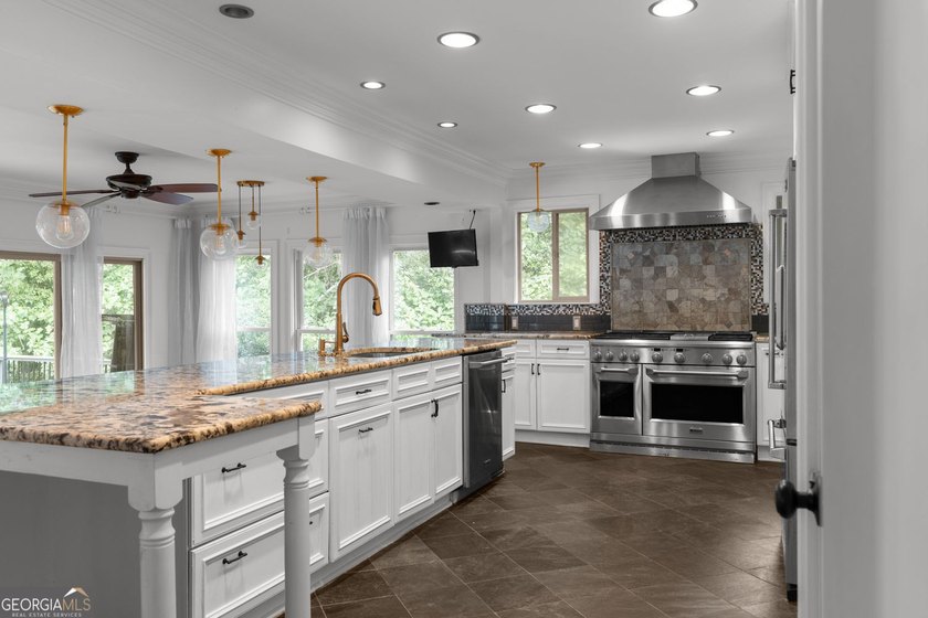 Nestled on a private wooded lot in the highly sought-after - photo 19