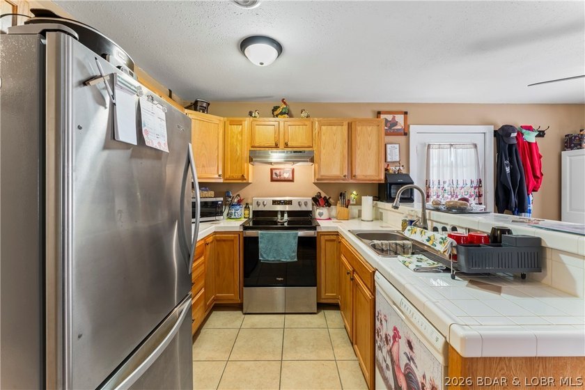 TWO HOMES &amp; A LAKEFRONT LOT - Unique Investment Opportunity at - photo 21