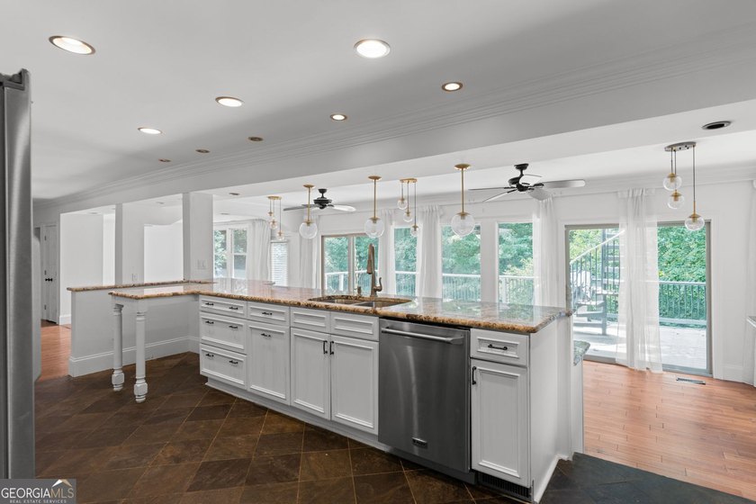 Nestled on a private wooded lot in the highly sought-after - photo 21