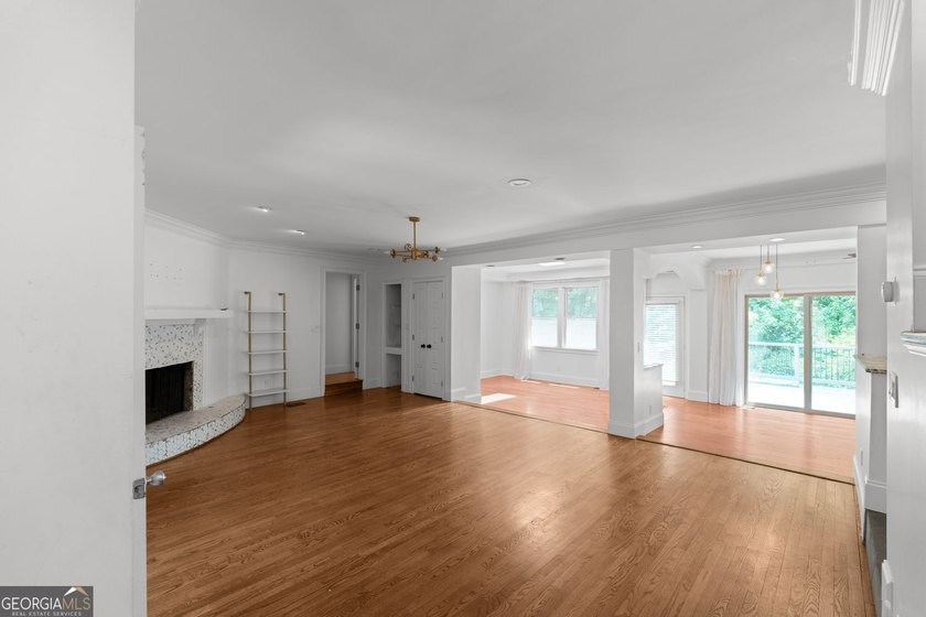 Nestled on a private wooded lot in the highly sought-after - photo 34