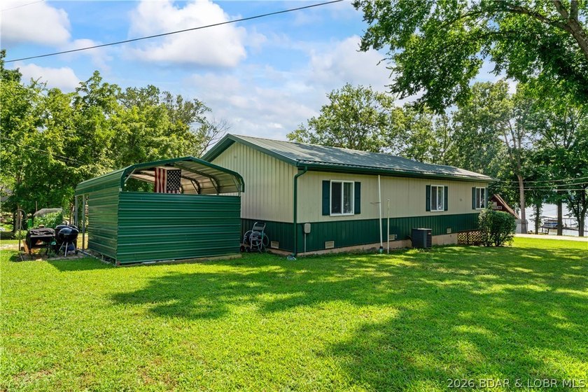 TWO HOMES &amp; A LAKEFRONT LOT - Unique Investment Opportunity at - photo 36