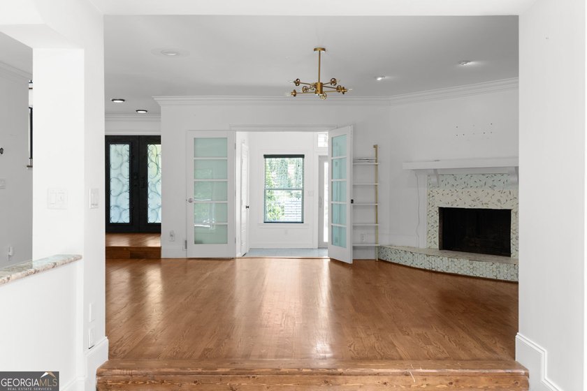 Nestled on a private wooded lot in the highly sought-after - photo 36