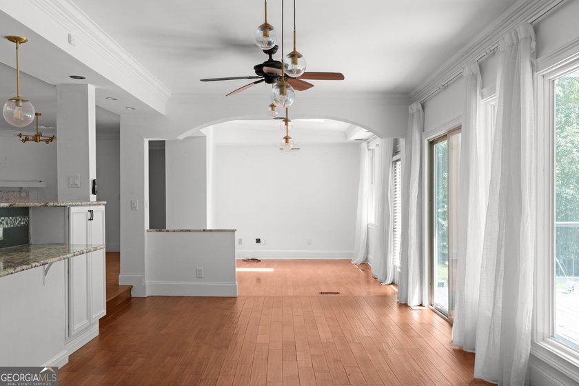 Nestled on a private wooded lot in the highly sought-after - photo 37