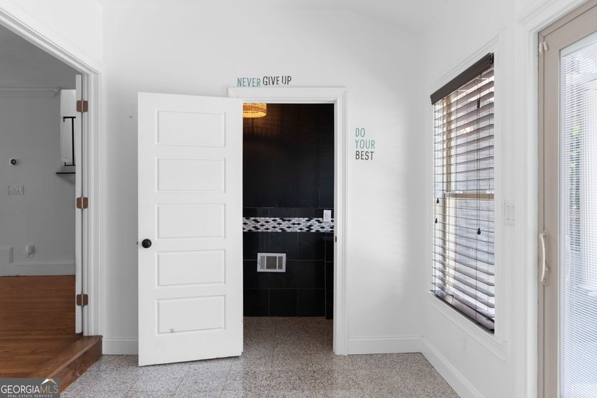 Nestled on a private wooded lot in the highly sought-after - photo 47